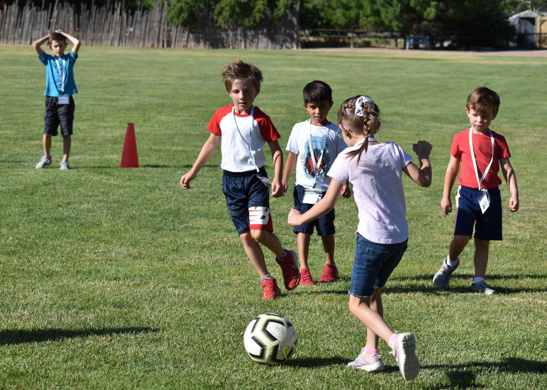 Campers playing soccer 