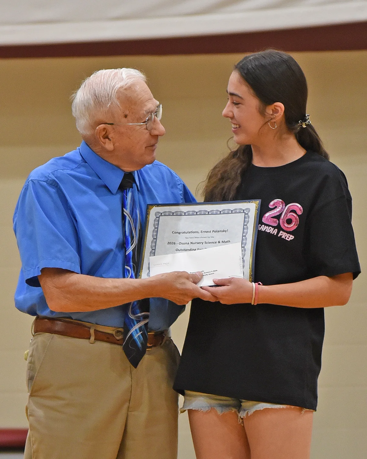 Student receiving award